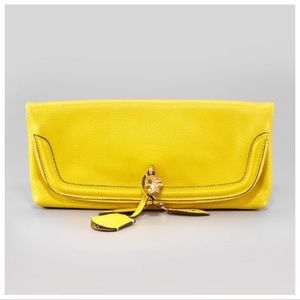 Alexander McQueen Yellow
Leather Skull fold over padlock clutch bag with key